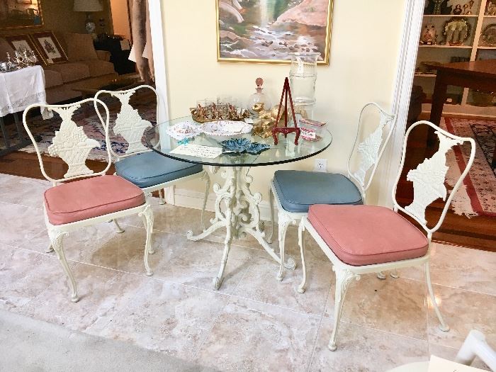 Glass top heavy painted iron table + 4 ornate chairs by Woodard