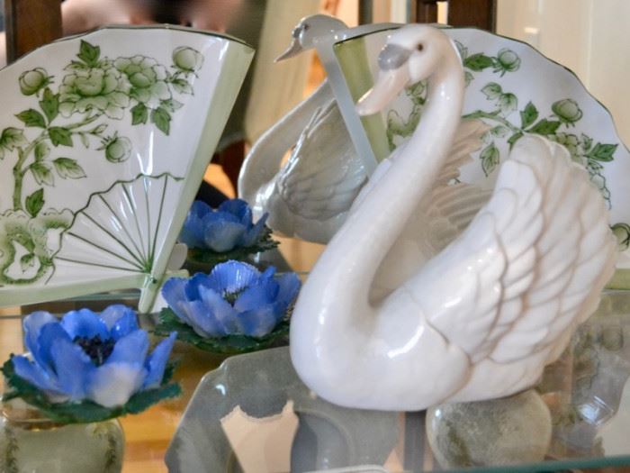 Porcelain fans and flower frogs and Lladro swan