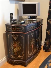 Painted cabinet and small Sharp TV