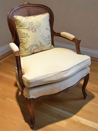 One of a pair of Weiman caned back chairs
