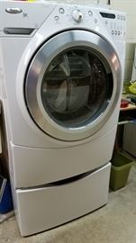 Awesome front load whirlpool dryer that is gas with matching washing machine. Both on pedestals period paid over $2,600 ,  asking 1300