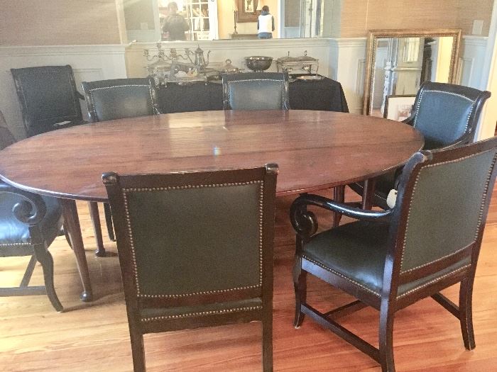 Beautiful solid wood custom made dining room table with 8 arm chairs