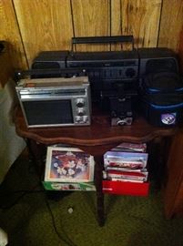 Small table, boom box, radio
