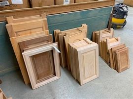 Assorted raised panel doors in pine and cherry