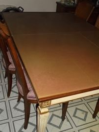 Dining table w/table pads, 1 leaf & 8 chairs