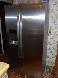 Stainless side by side refrigerator  4 yr old 