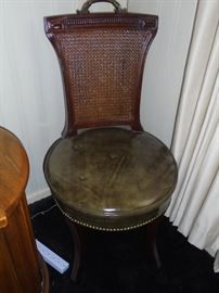 Green round bottom cane back chair no rips or tears