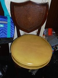 Yellow round bottom cane back chair no rips or tears