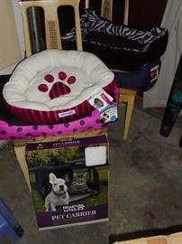 4 new never used pet beds and NIB pet carrier