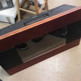 This is a nice wall-hanging heater with two heat level settings and adjustable glowing flames. Model Northwest 80-EF422S with remote.   