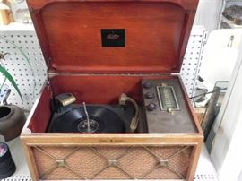 Antique portable record player/am radio. General electric model Electronic Reproducer. 