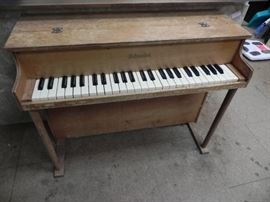 Old children's piano made by Schoenhut clock company. They utilize clock chimes to make each note and this thing sounds very cool when played. 