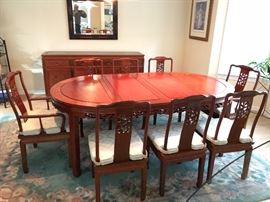 Dining room set showing all 10 pieces and chair cushions -  craved detail on chair backs and table trim