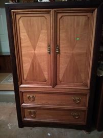 Armoire part of 4 piece bedroom set which includes 2 night stands and a triple dresser
