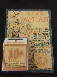 Pay toilet plaque