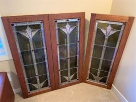 Antique stain glass panels with contemporary trillium design