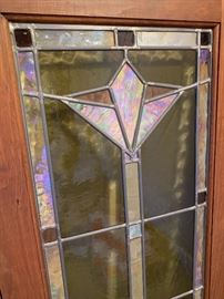 Antique stain glass panels with contemporary trillium design
