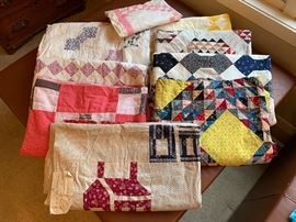 Several antique/vintage hand stitched quilt fronts 