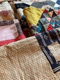 Several antique/vintage hand stitched quilt fronts 