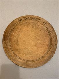 Antique English round wood bread board with raised “Bread” motif