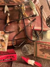 Large antique fish hooks.  There are several in various sizes