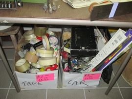 Boxes of tape and car items, each item in the box is $2 or less.