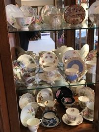 Assorted cups and saucer sets.