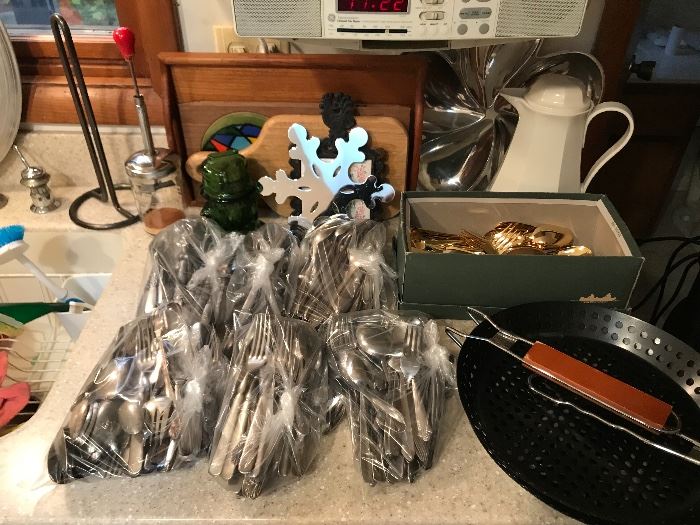 Assorted flatware and other kitchen goodies