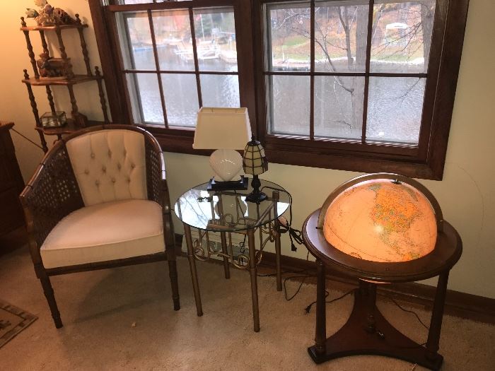 Lighted globe, glass top table, 1970's era chair