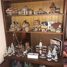 We have over 100 Dickens Village (Dept. 56) buildings (this is just a fraction).  Most have original boxes available.  There are also MANY additional items (People, Trees, Vehicles, etc.)