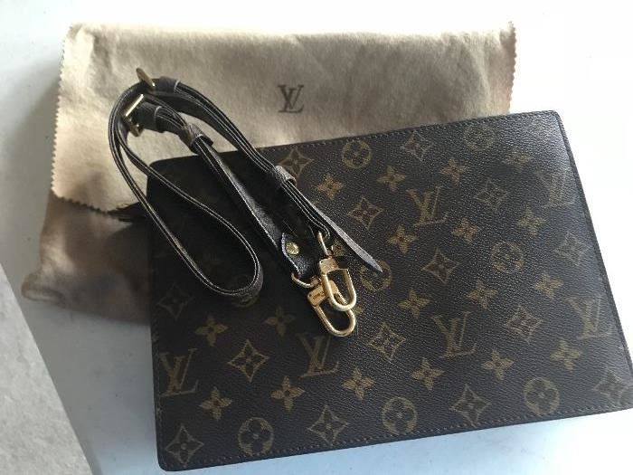 Genuine (guaranteed) Louis Vuitton handbag with original dust bag.  Appears to have never been used.