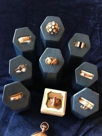 Initial "B" ring is 10k, All others are 14k gold