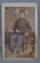 AUTHENTIC US CIVIL WAR ERA CARTE DE VISITE (CDV) OR CABINET CARD DEPICTING CONFEDERATE SOLDIER IN UNIFORM WITH FIREARM