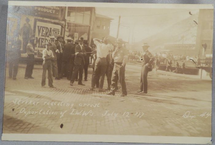 RARE "DIX 44" PHOTO POSTCARD DEPICTING "STRIKER RESISTING ARREST / DEPORTATION OF IWW'S JULY 12 '17".  THIS EVENT WAS A MAJOR MINING UNION STRIKE THAT WAS MET WITH ILLEGAL DEPORTING OF MINERS IN BISBEE, ARIZONA