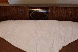 Footboard.  Originally bought at Sprintz for about $1500. Handmade in Philipines by Lineage Home Furnishings. Beautiful rattan bed sleigh. Damaged. $150