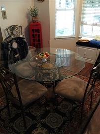 Glass top table and chairs $400