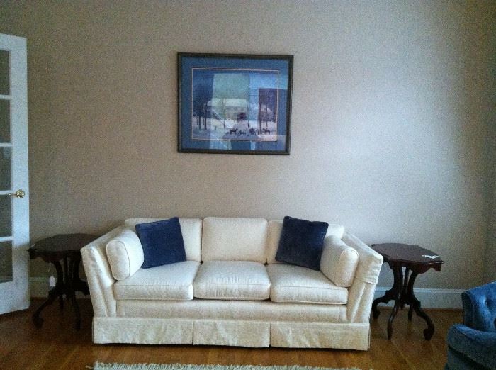  Cream color loveseat and Winter print