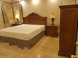 Thomasville cherry wood bedroom set. King size headboard, two nightstands with marble tops, tall dresser and long dresser