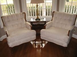 Pair of French Provincial armchairs-one has some teeth marks on the arm