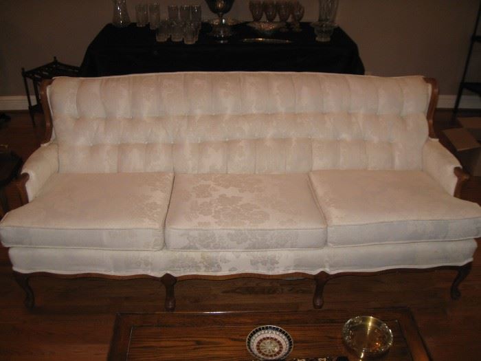white tufted back sofa matching pair of chairs