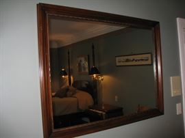 large wood framed mirror