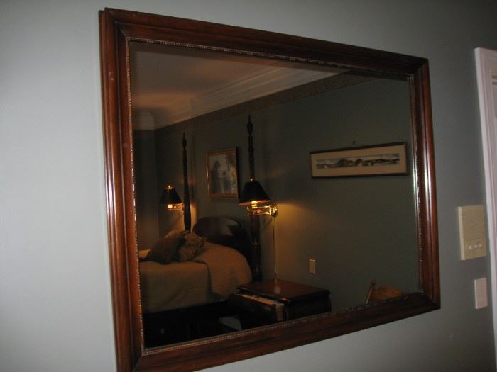 large wood framed mirror