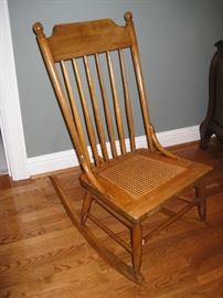 one of several cane bottom chairs-this one is a rocker