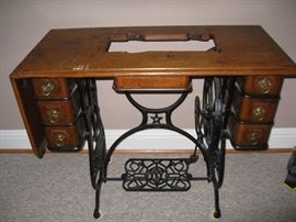 Domestic sewing machine base