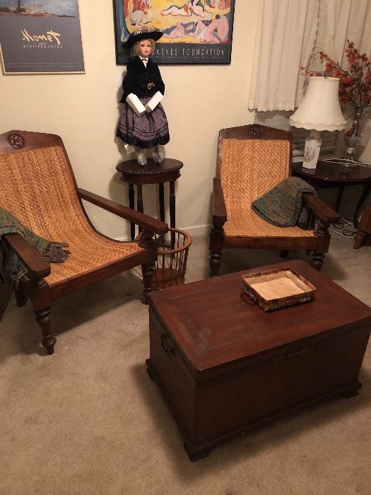 Antique Plantation Chairs with a well conditioned vintage storage chest. 