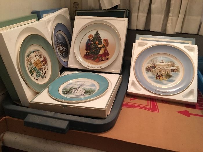Avon collectible plates. All unused and in boxes. These are plates with gold rims.