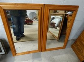 Pair of matching wood framed wall mirrors