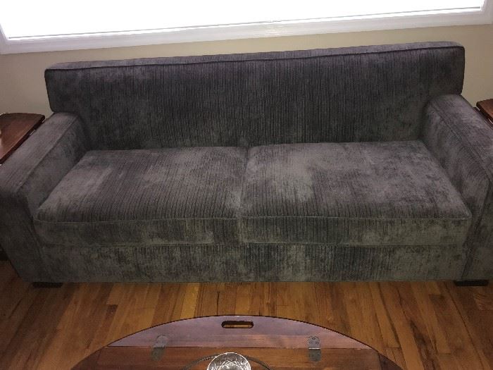 beautiful Williams and Gold Grey microfiber Sofa in like new condition 200.-