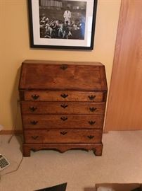Chippendale Period, 1770-1790 slant lid desk. Most likely American made from New England. The piece is primarily bird's eye maple. It has an old refinish and replaced brasses.