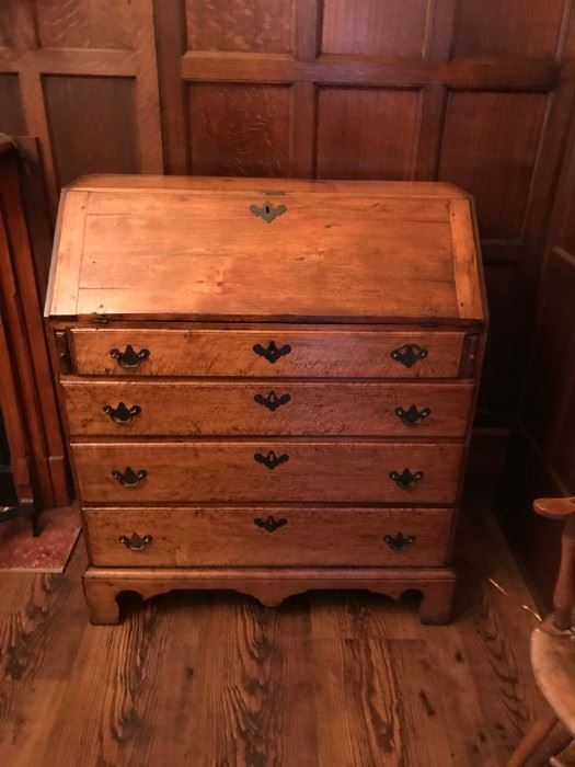 Chippendale Period, 1770-1790  slant lid desk.   Most likely American made from New England.  The piece is primarily bird's eye maple.  It has an old refinish and replaced brasses.   This is a stunning piece!